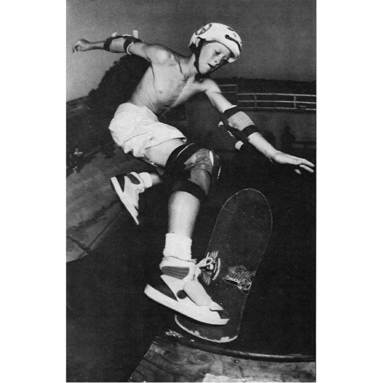 A black and white photo of Danny Way doing a trick on a skateboard.