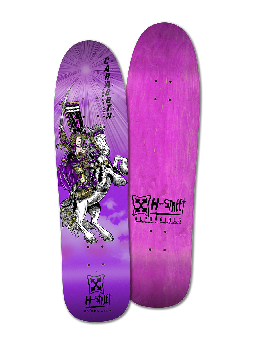 Two purple Woodchuck CARABETH WARRIOR skateboards are shown. One side has a dramatic CaraBeth Burnside illustration on a rearing horse under light rays; the other features a simple H-Street logo.