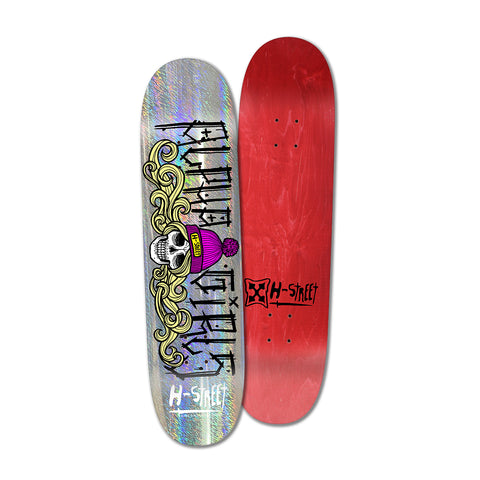 A skateboard deck with a colorful graphic design featuring a skull with flowing blonde hair and a pink beanie labeled 'H-Street' on the bottom on a multicolor background. The top deck is red with the H-Street logo.