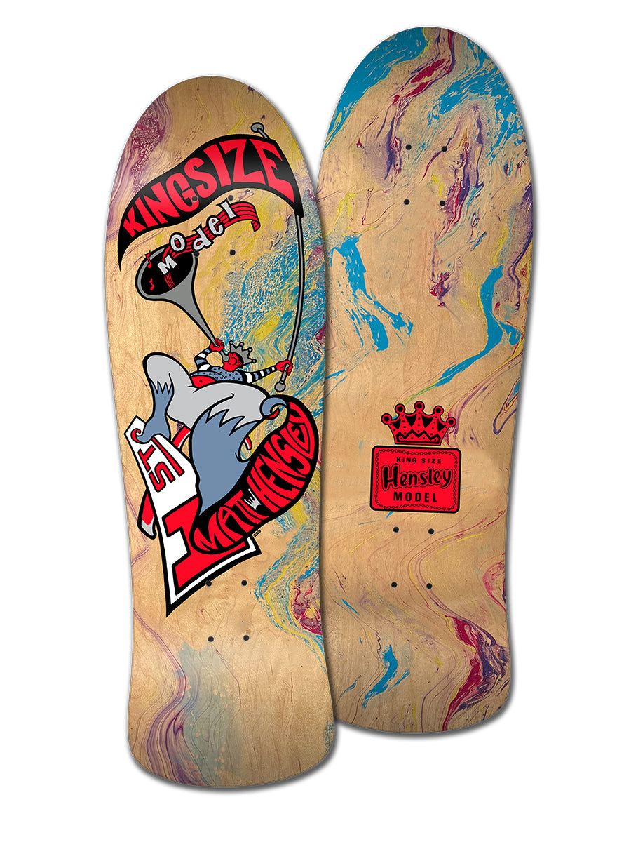 Two Legend Skates decks with marbled wood: the MATT HENSLEY KINGSIZE HORNBLOWER G SERIES featuring a cartoon mouse and crown graphics, plus "HENSELY MODEL" and "Kingsize Hornblower" labels.