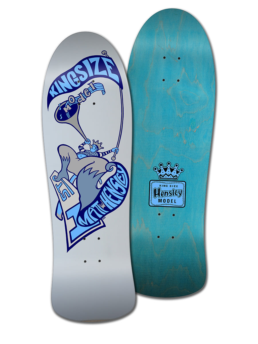 Two skateboard decks: a light gray Legend Skates MATT HENSLEY KINGSIZE HORNBLOWER G SERIES with a blue cartoon gorilla and KINGSIZE text, and a teal H-Street Matt Hensley Pro Model with crown logo and The New Hensley Model text.