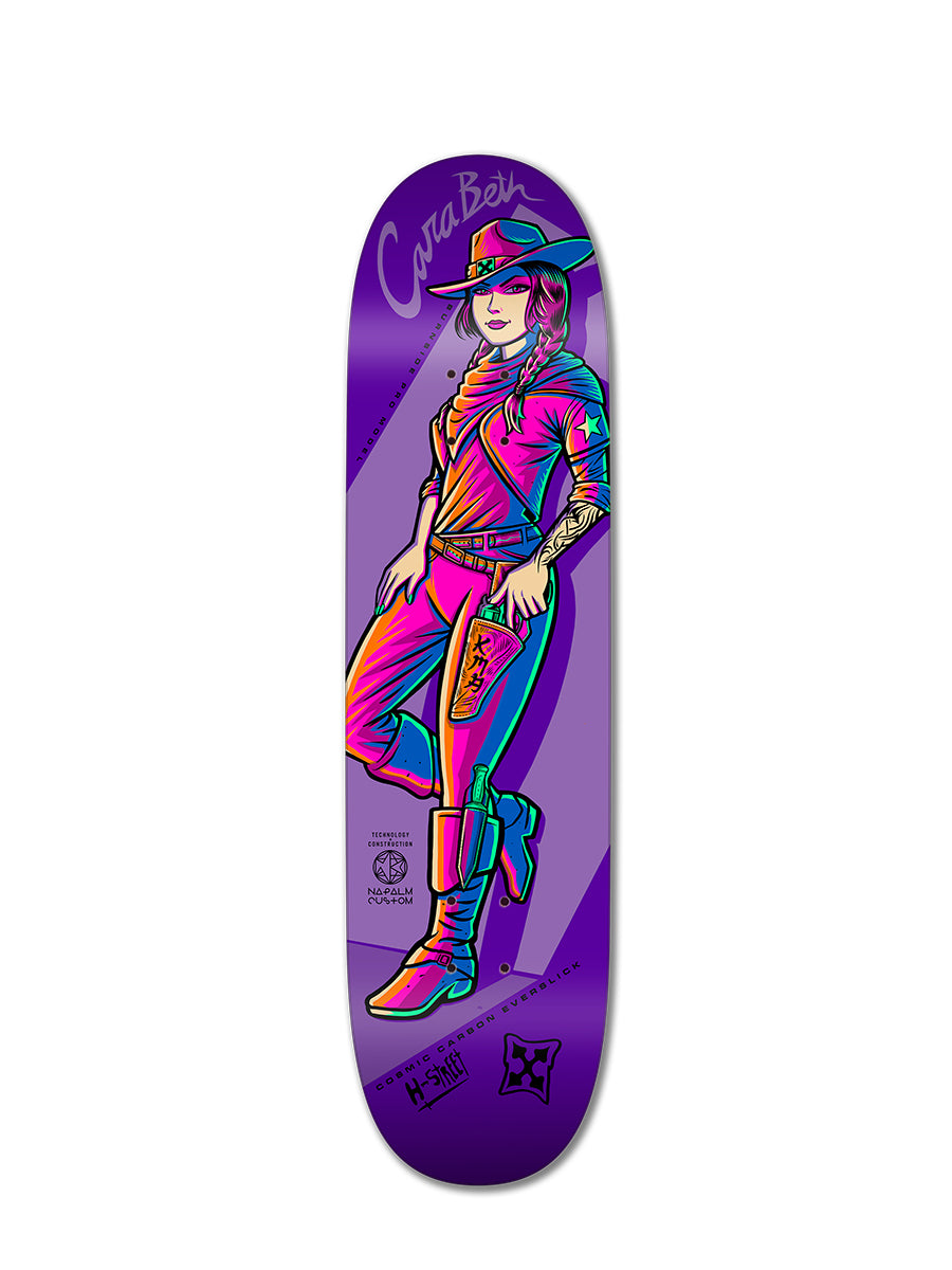 The Woodchuck ALPHA GIRLS COSMIC CARBON skateboard is a durable 4-ply hybrid deck in purple, featuring an illustrated woman in a cowboy hat and pink outfit with colorful accents and tattoos, plus "Cara Beth" scripted at the top.