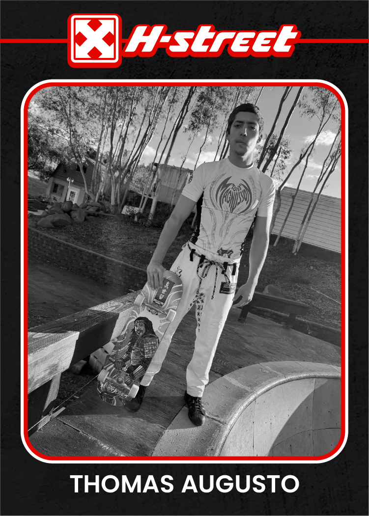 A card reminiscent of a baseball card, reading H-Street, Thomas Augusto, with a black and white image of Thomas standing with his skateboard.