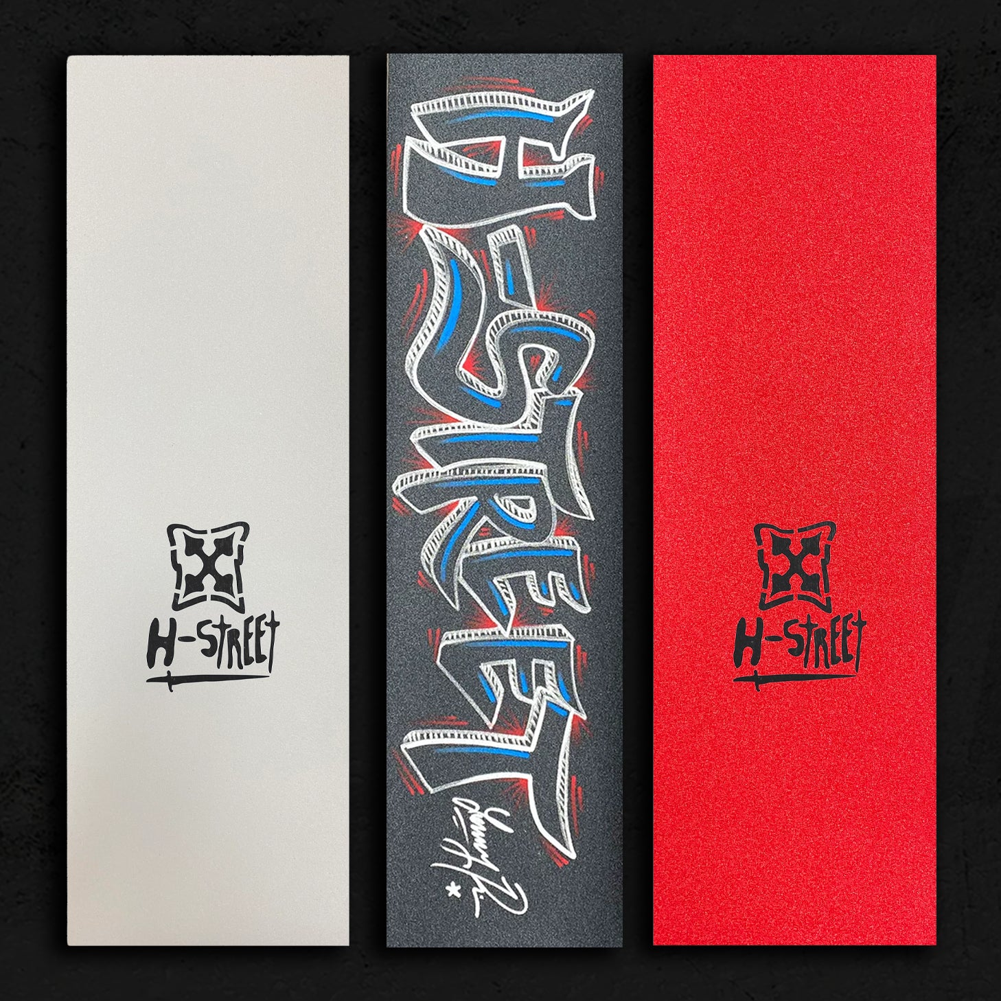 Three strips of grip tape: one white, one grey with hand lettering, and one red on a textured grey background.