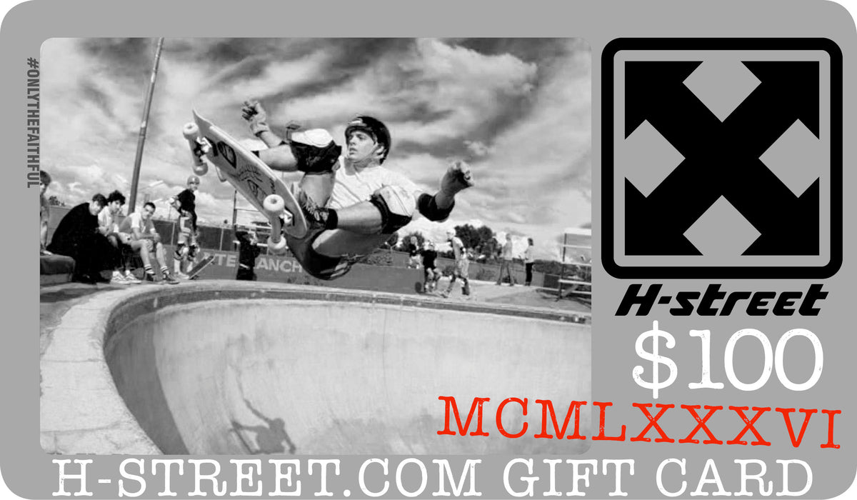 A skateboarder does an aerial trick over a bowl, showcasing the H-STREET GIFT CARD by H-Street Skateboards—an ideal holiday gift, featuring “MCMLXXXVI” in red and the H-Street logo in the top right corner.