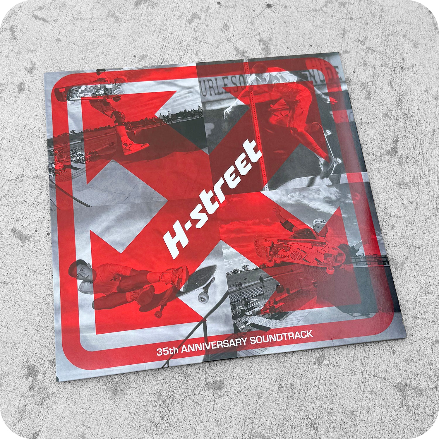 A record cover on concrete features bold red graphics, "Lady Luck" across the center, skateboarding action photos, and at the bottom reads 12 DAYS OF CHRISTMAS 2025, PACKAGE #3—celebrating with this special Lady Luck release.