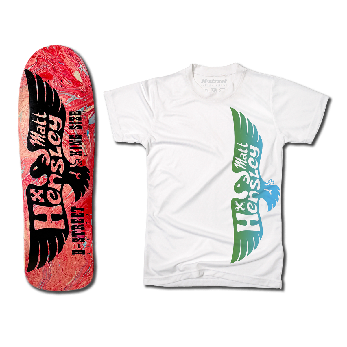 The bottom of a Hensley Eagle King Size Skateboard deck. The bottom is hydro dipped with a black eagle. Next to it is a white shirt with the green and blue eagle logo on the front.