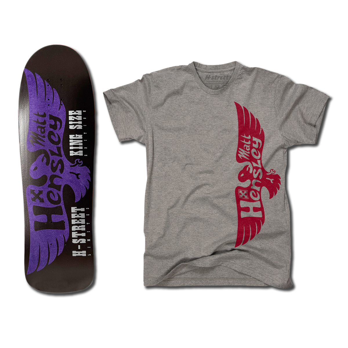 The bottom of a Hensley Eagle King Size Skateboard deck. The bottom is black with a purple eagle. Next to it is a grey shirt with the red eagle logo on the front.