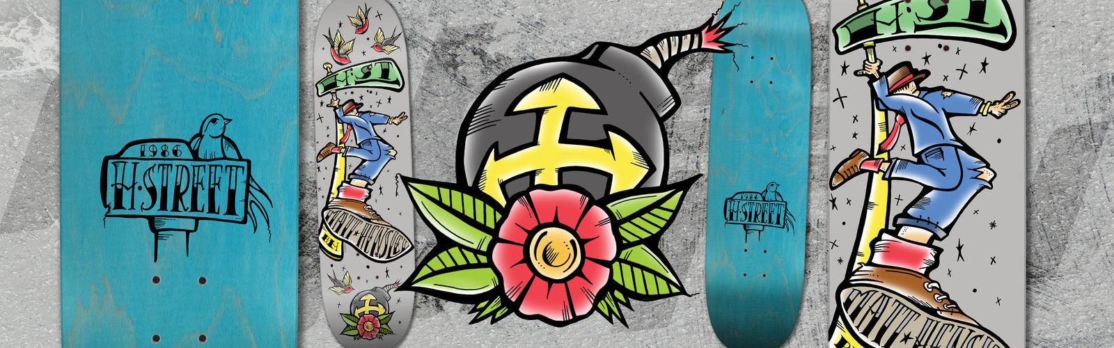 A graphic with three skateboards, each featuring bold, colorful designs: a bird on a blue deck, a cartoon figure on a grey deck, and a central image of a bomb with a fuse, anchor, rose, and leaves. The background is textured grey.