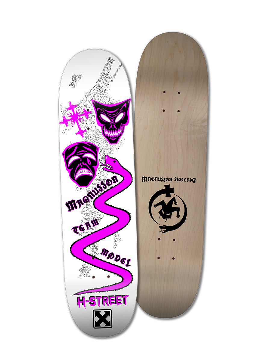 Two 80’s skateboard decks side by side: left is Woodchuck’s T-MAG MASKS & SERPENT, featuring white art with two purple masks, a cross, and zigzag path. Right is a plain wood deck with bold black Magnusson Designs graphics.