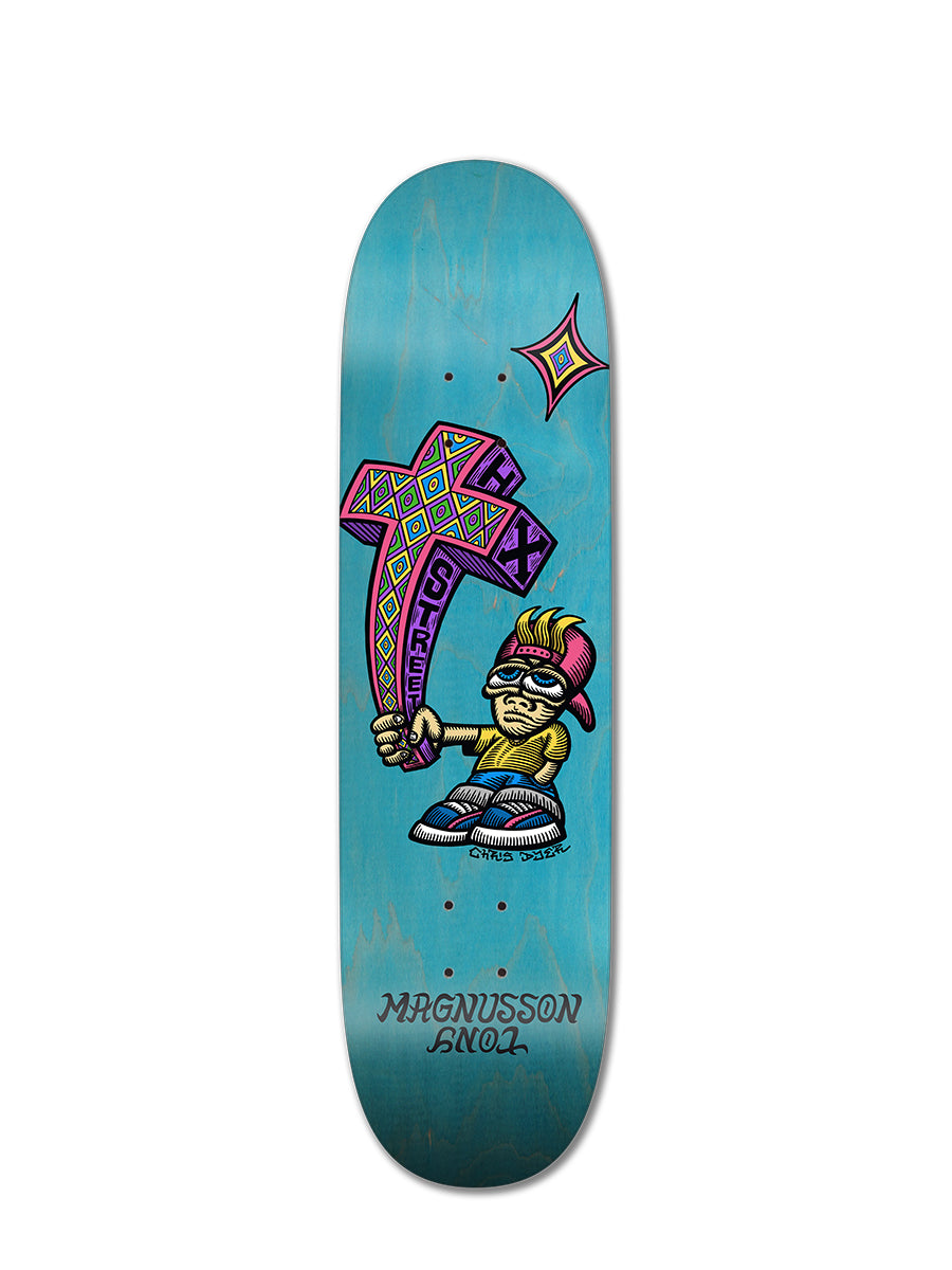 The Woodchuck T-MAG/DYER SE, KID'N'CROSS skateboard deck features Chris Dyer's 90s-inspired art of a troll-like character with glasses and a cap, holding a vibrant cross labeled LUXTURE. "MAGNUSSON 8.10.2" appears at the bottom.