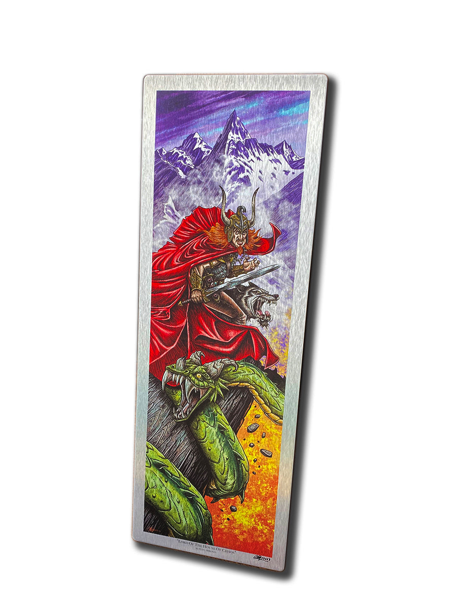 A fantasy-inspired Fian Arroyo-style illustration shows an armored warrior in a red cape battling a green dragon on a cliff with snowy peaks and fire, making Henco North's VIKING METAL ART the perfect décor for any space.