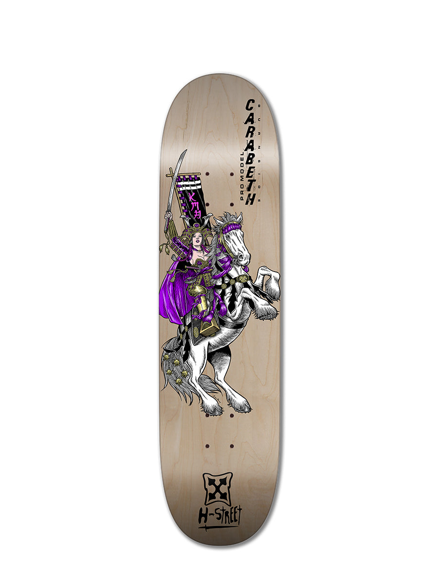 The Woodchuck CARABETH WARRIOR skateboard deck showcases a knight in purple armor on a white horse, holding a flag and sword, with "CaraBeth Burnside" on the wood grain—a tribute to girls skateboarding history.