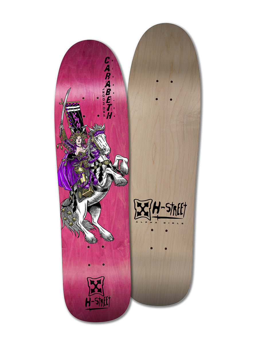 Two skateboard decks by Woodchuck: the "CARABETH WARRIOR" with a pink background and knight artwork of skateboarding pioneer CaraBeth Burnside, and a plain wood deck. Both feature the H-Street logo and Carabem text.