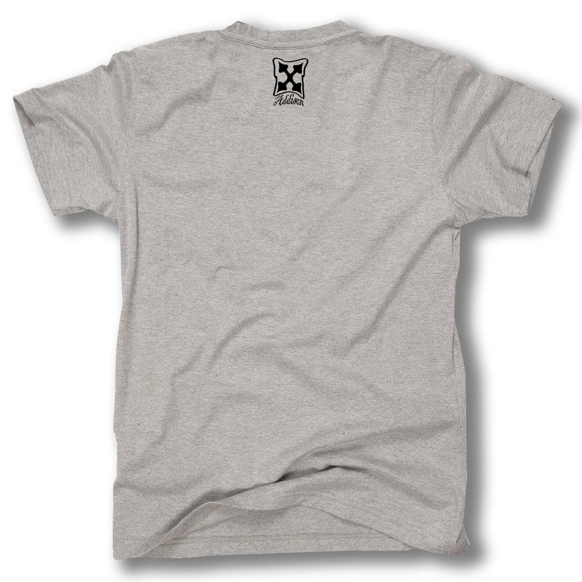 A plain light gray Minuteman t-shirt from the ADDISON TAYLOR DESIGN T-SHIRTS line is shown from the back, featuring a small black and white Addison Taylor logo with text near the top center below the collar.