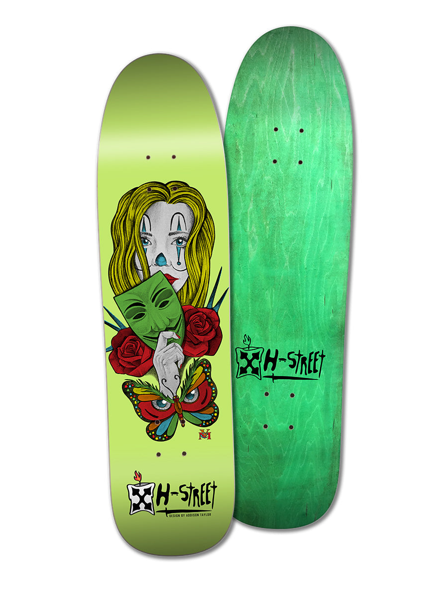 Two green Legend Skates: one features the Addison Taylor Girl & Butterfly design with a masked woman, red rose, and butterfly; the other is plain green with Pop Wedge shape and small logo. Both showcase the iconic brand emblem.