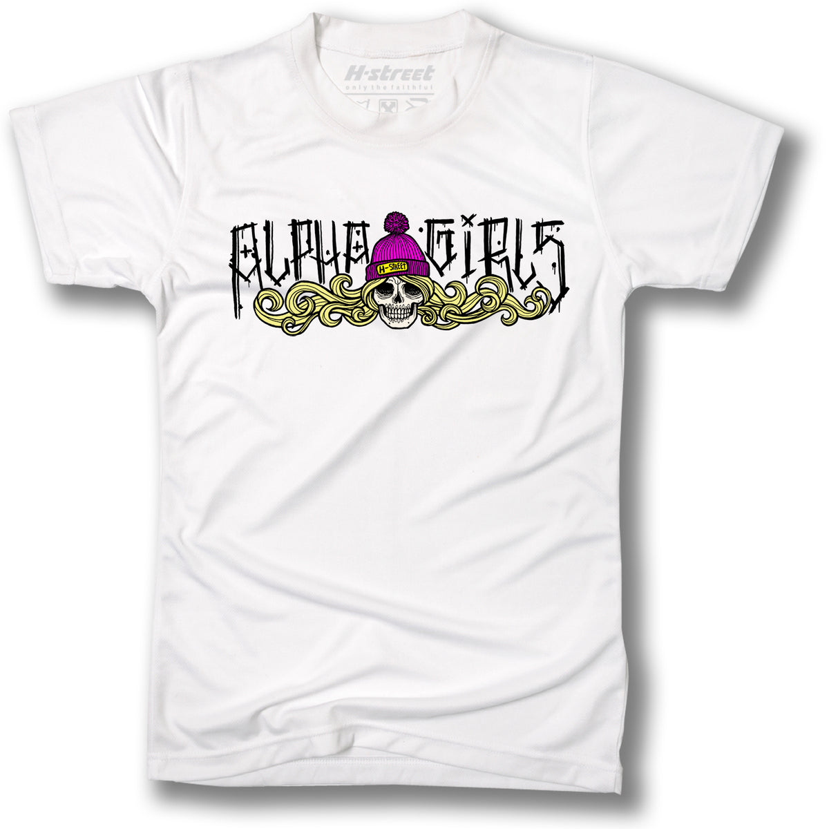 The ALPHA BEANIE BABE DESIGN T-SHIRT by Minuteman features “Alpha Girls” in bold black above a skull with yellow hair and a purple beanie with pink pom-pom—showcasing true Alpha Beanie Babe style.