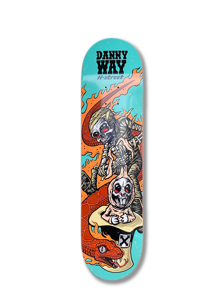 The Woodchuck DANNY WAY SERPENT & RABBIT skateboard deck showcases bold, colorful art of a skeleton mummy riding a snake amid flames and a dramatic sky—a striking, iconic Danny Way design.