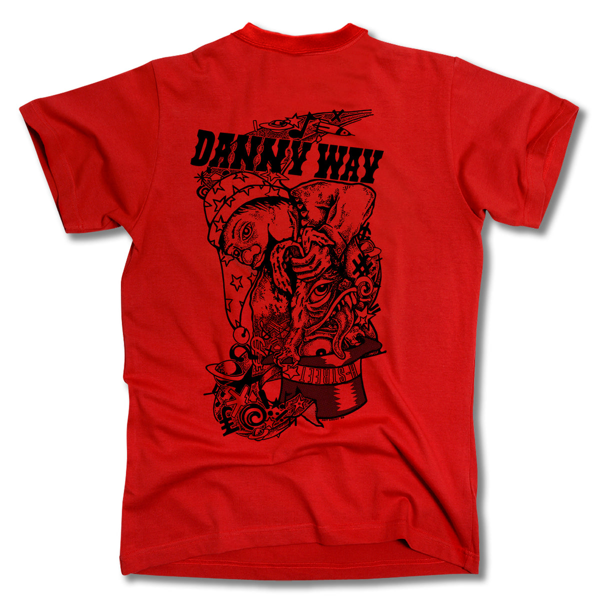 The Minuteman DANNY WAY RABBIT IN THE HAT TEE is a red, USA-made shirt with bold DANNY WAY text and a large abstract black Rabbit in the Hat graphic, featuring surreal art, stars, and a top hat on the back.