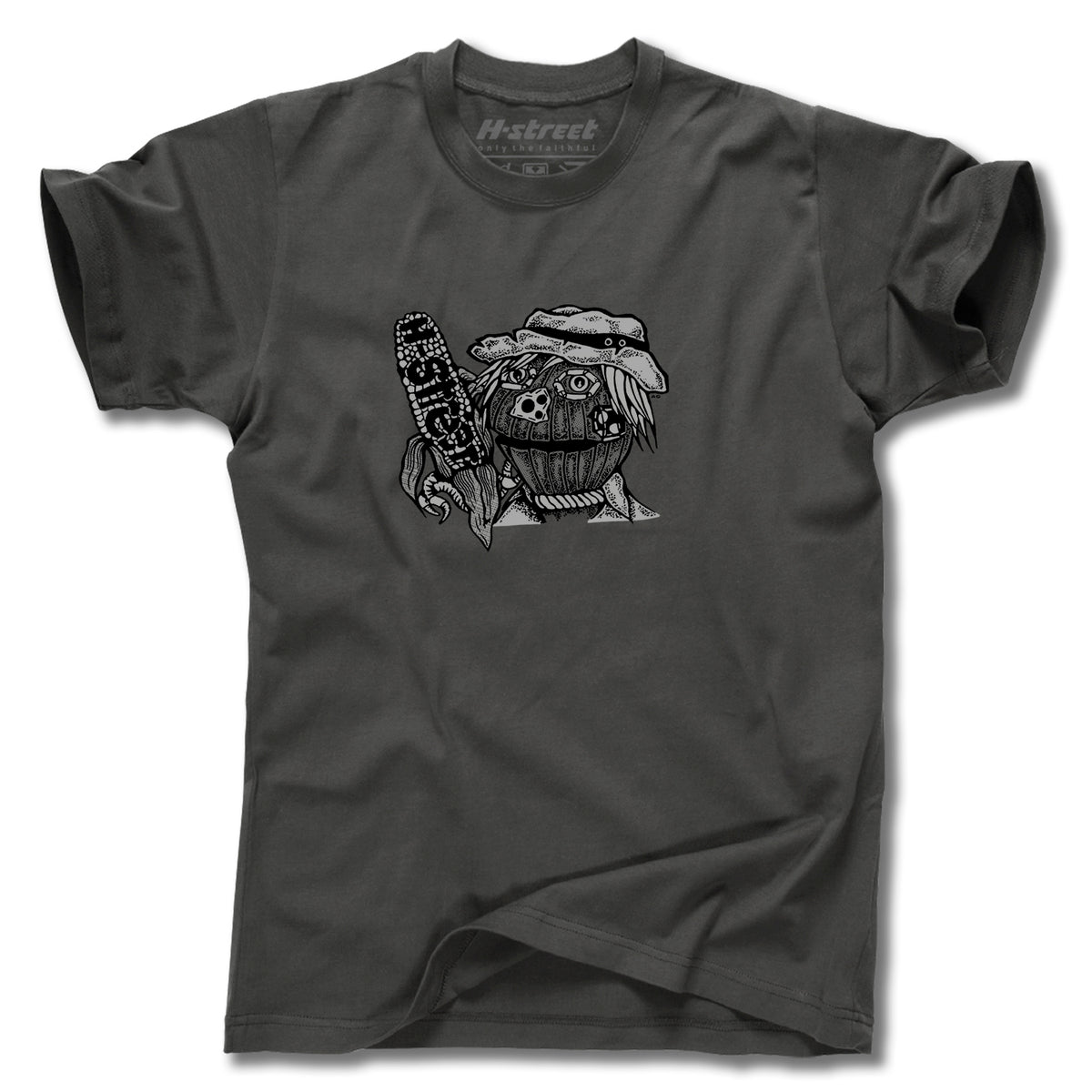 The Minuteman EDDIE ELGUERA EL GATO SCARECROW TEE is a charcoal gray graphic tee with a black-and-white cartoon warrior illustration. Made in the USA.
