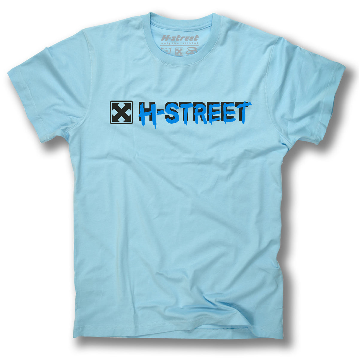 The Minuteman TONY MAG HELL CONCAVE TEE is a light blue shirt featuring a bold H-STREET logo in blue and black on the chest, with a black and white square symbol inspired by Scott Obradovich’s original Bat Logo design.
