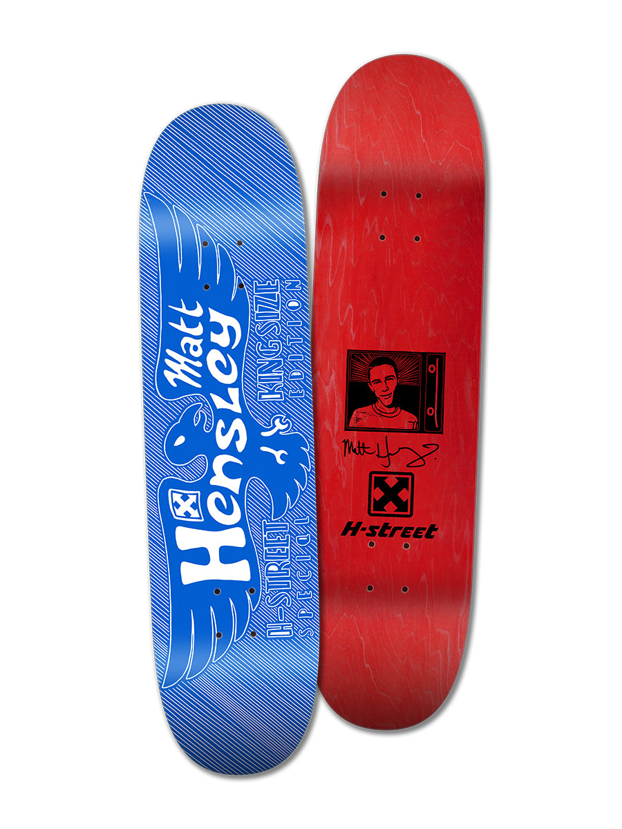 Woodchuck’s 12 DAYS OF CHRISTMAS 2025, PACKAGE #6 features two decks: a blue Matt Hensley Kingsize Eagle re-issue with wing graphics and a red deck showing a TV illustration, signature, H-Street logo, and classic text.