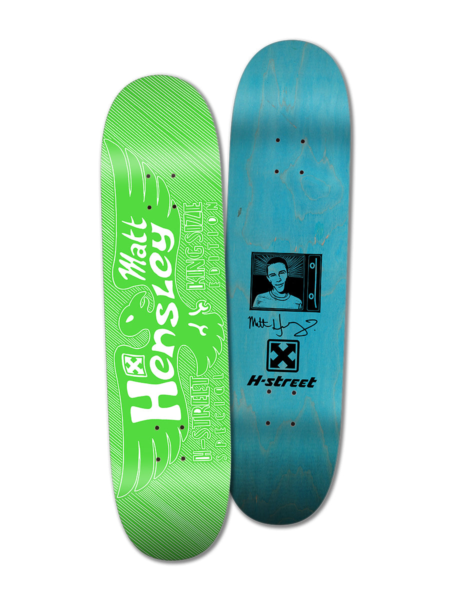 Package #6 from Woodchuck's 12 DAYS OF CHRISTMAS 2025 includes two original re-issue decks: a green Kingsize Eagle Matt Hensley and a blue H-Street portrait deck—tributes to skateboarding legends.