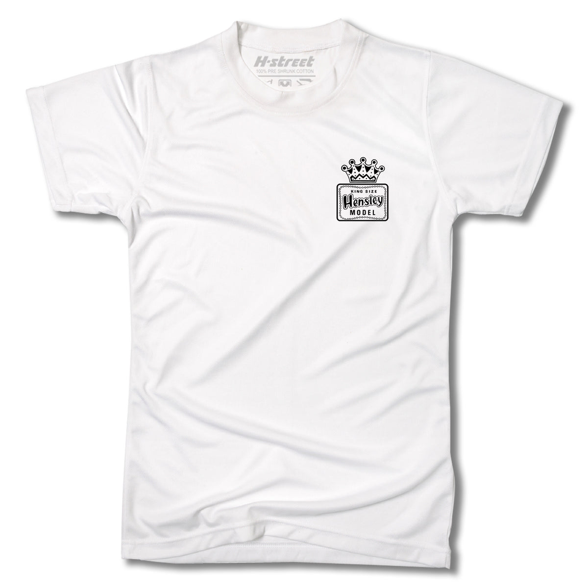 The Minuteman MATT HENSLEY KINGSIZE HORNBLOWER TEE is a classic white short-sleeve t-shirt with a small black and white chest logo—crown above rectangle and “H-Street Hensley Model” text. Timeless style, made in the USA.