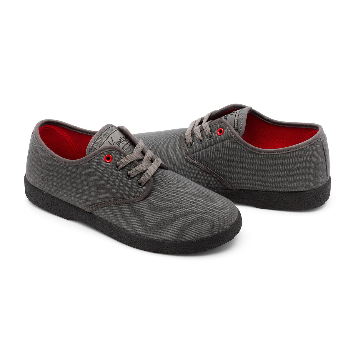 A pair of Kingston Union Mfg WINO HENSLEY COLORWAY shoes with grey canvas uppers, black rubber soles, grey laces, and red inner linings are displayed side by side on a white background.