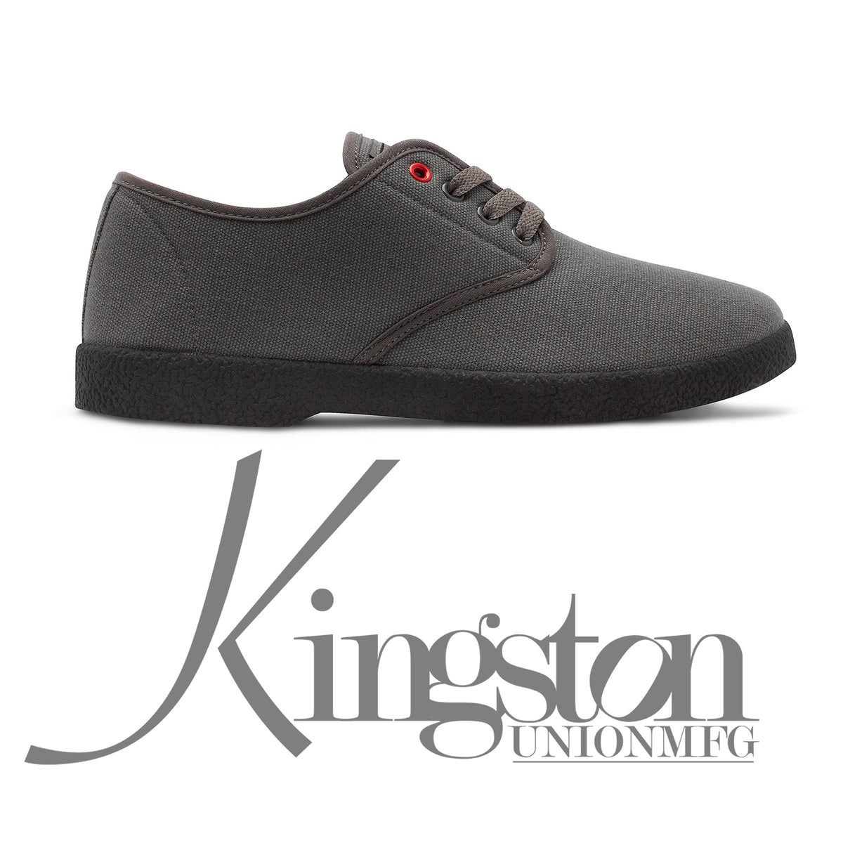 Side view of the KINGSTON UNION MFG WINO HENSLEY COLORWAY—a gray canvas shoe with black sole and red eyelet—shown above a bold, stylized Kingston Union Mfg logo on a white background.