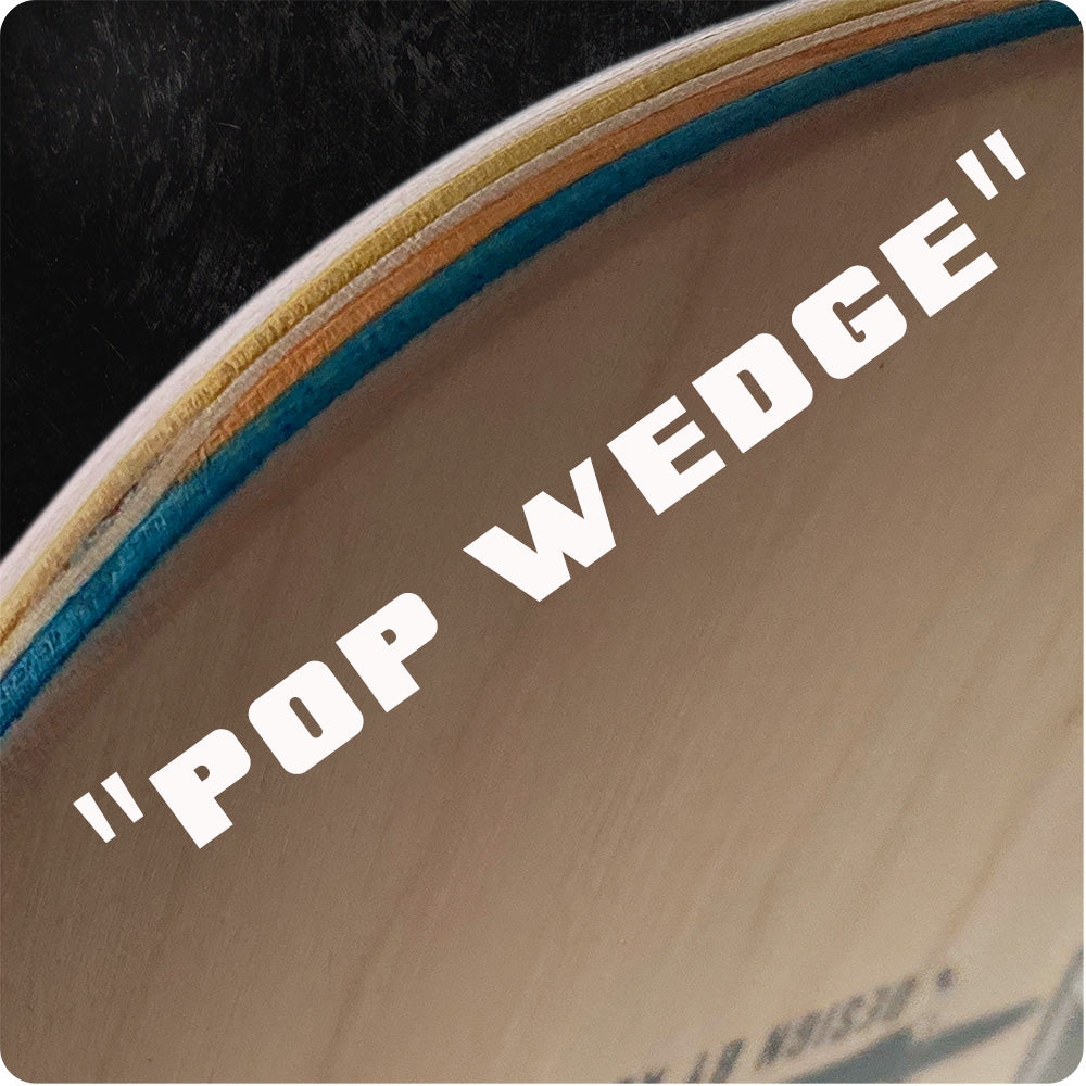 Close-up of the layers of an ADDISON TAYLOR GIRL & BUTTERFLY DESIGN skateboard deck by Legend Skates, with bold white POP WEDGE text across the image.