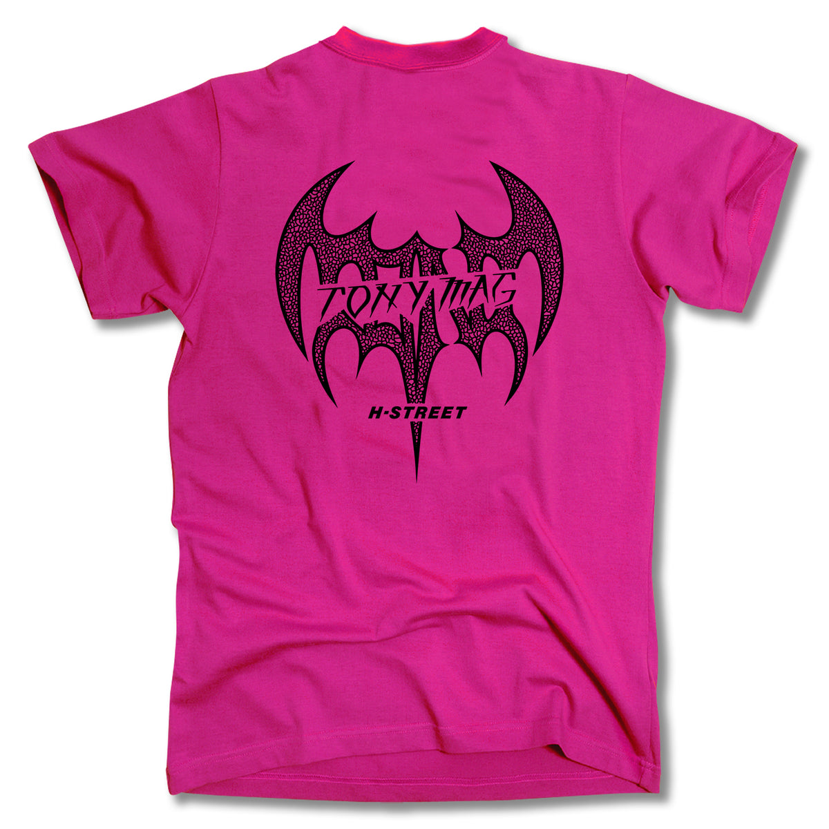 The Minuteman TONY MAGNUSSON BAT LOGO TEE is a bright pink shirt with a large black stylized bat graphic on the back, featuring “TOXIC WASTE” and “H-STREET” inside the design. This classic Tony Mag Bat tee offers made in USA quality.