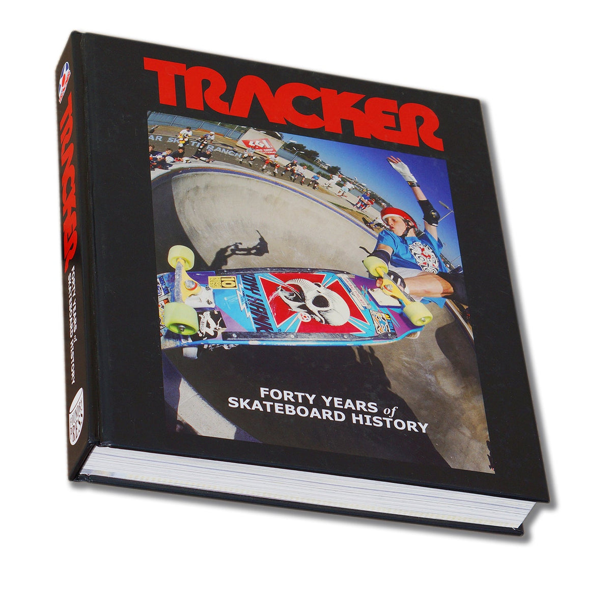 Cover of the 'TRACKER Forty Years of Skateboard History' featuring a graphic with the Tracker logo and image of a skateboarder.