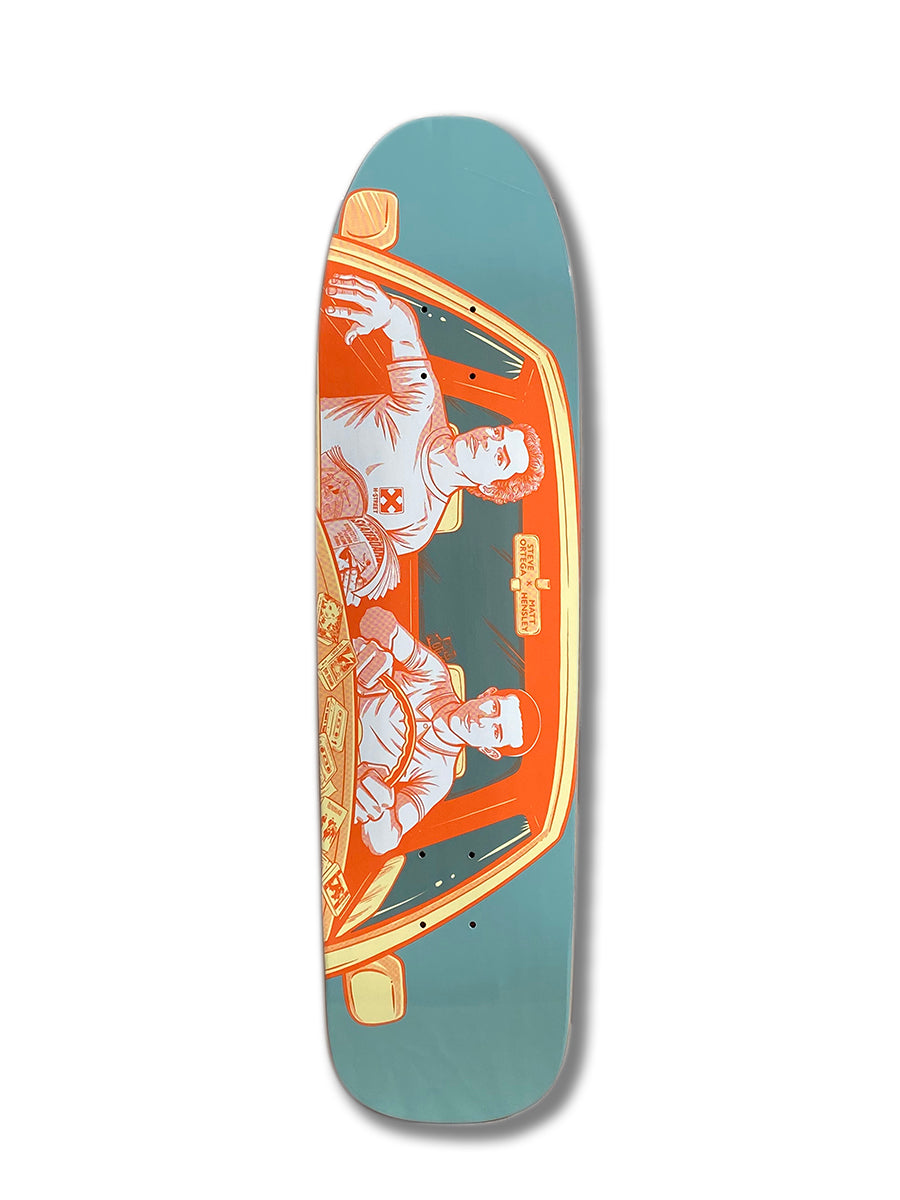 The Woodchuck HENSLEY X ORTEGA VISTA B SERIES skateboard deck features an illustrated design of two men driving, seen through a windshield with dashboard and money details, in orange, teal, and light blue tones. Inspired by street skating and the OG Vista crew.